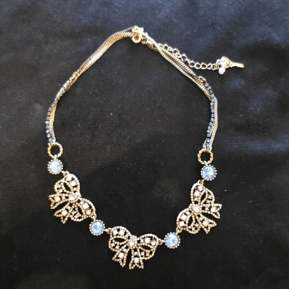 Betsey Johnson Gold Bow Necklace with Blue Accents